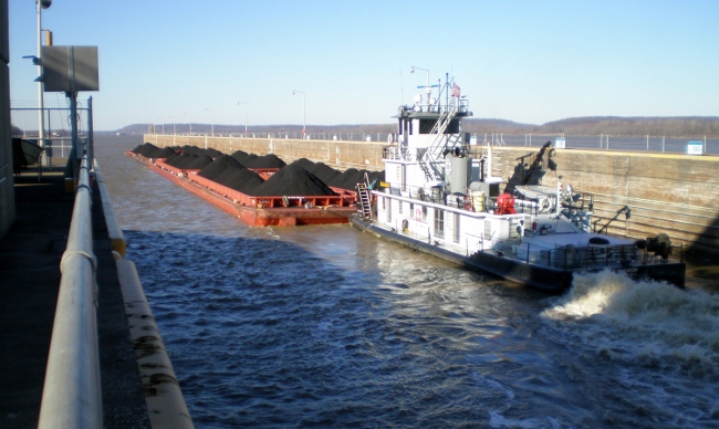 A barge locking through at Smithland Locks and Dam in Brookport, Illinois. A barge locking through at Smithland Locks and Dam in Brookport, Illinois.
